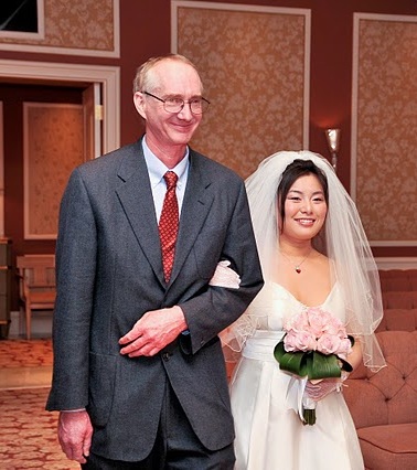 The standin uncle walking the beautiful bride down the aisle